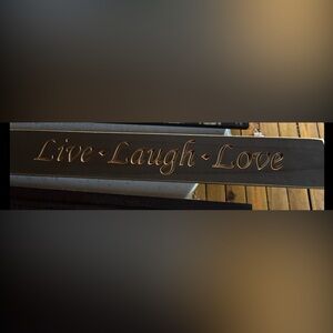 Black and Gold Decorative Sign